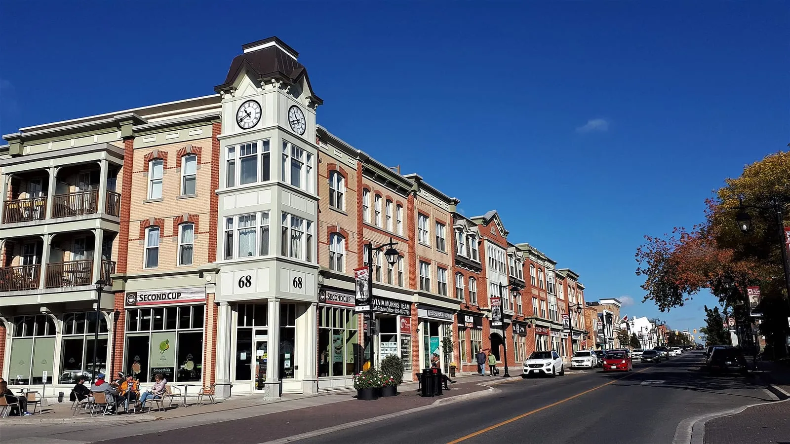 Heritage-style shops and a clock tower building along Main Street in Markham Village.