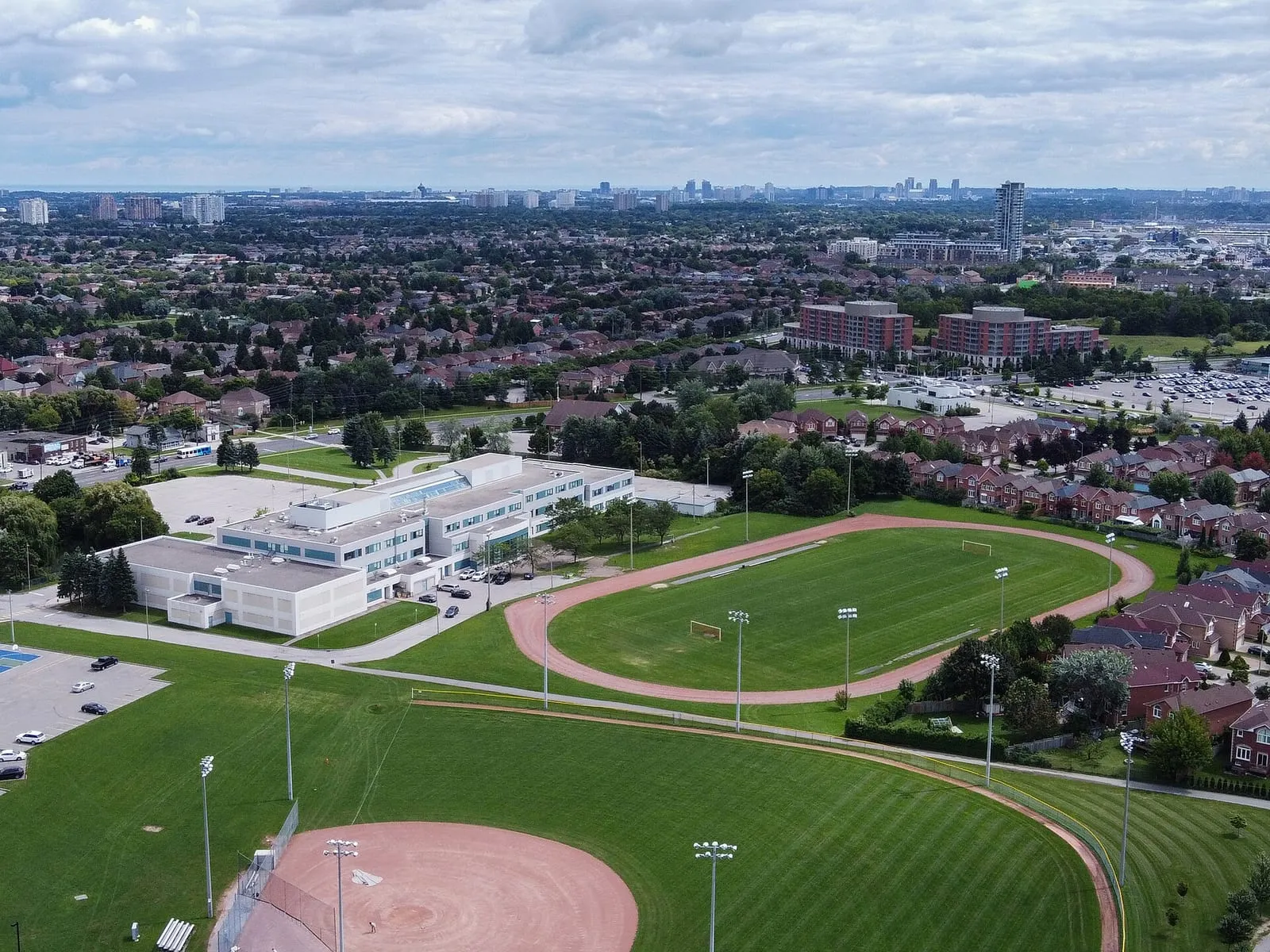Aerial view of Milliken Mills High School playing fields and the surrounding homes in Milliken Mills, Markham.