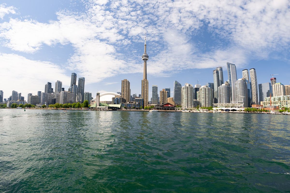 The downtown Toronto skyline and the CN Tower seen across the harbour from Lake Ontario.