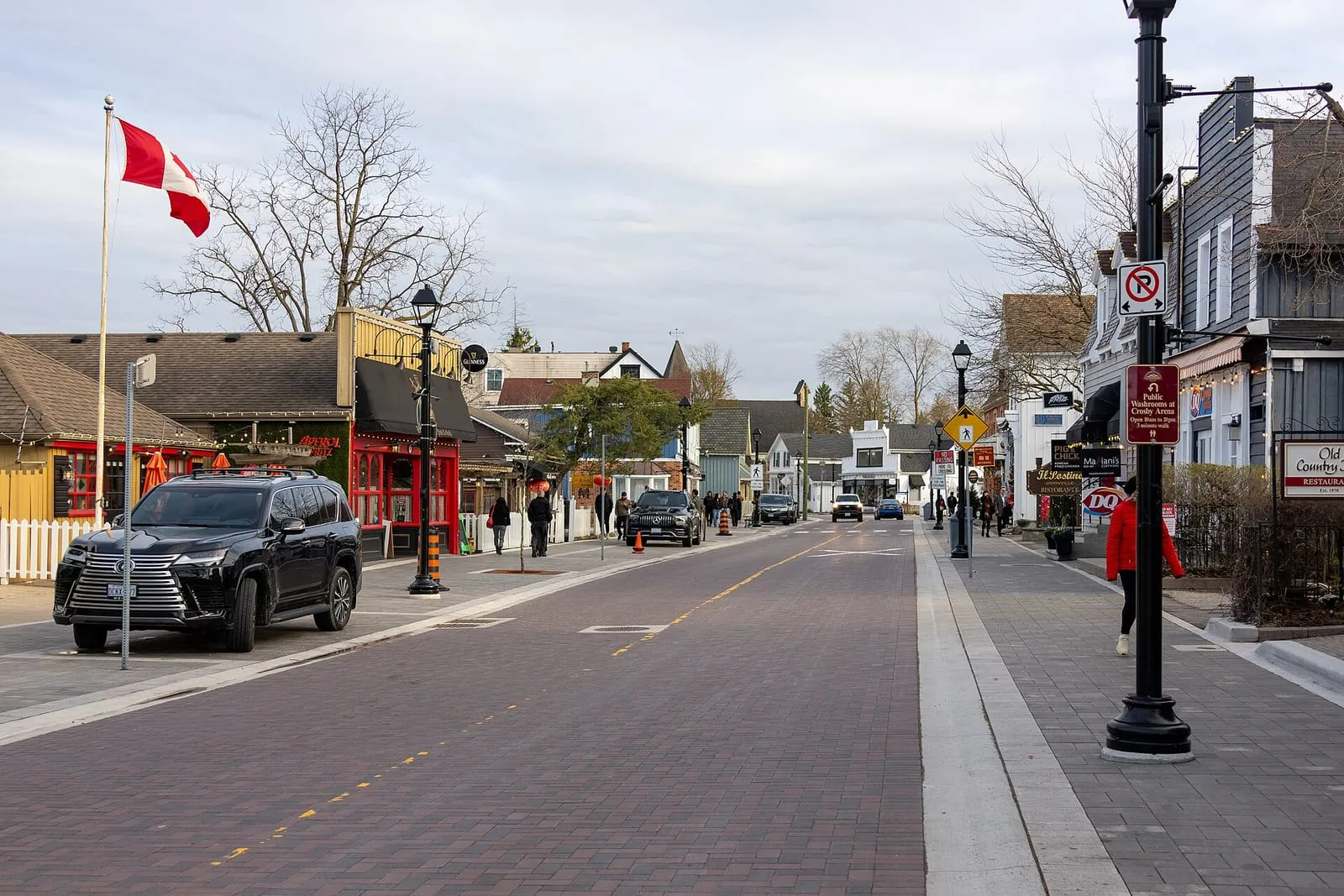 Historic shops and a Canadian flag along Main Street in Unionville, Markham.